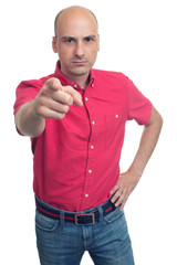 angry bald man pointing finger at you. Isolated