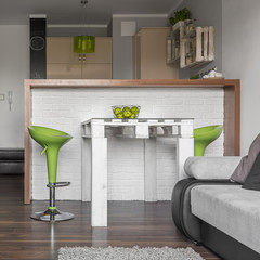 Grey flat with green details