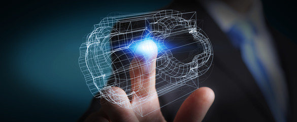 Businessman holding digital 3D engine