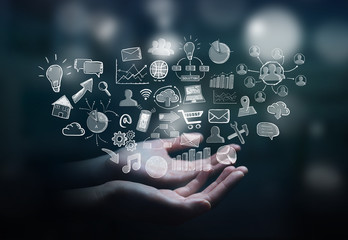 Businesswoman holding hand drawn web icons