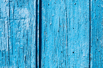 Fototapeta na wymiar three old blue painted wooden board