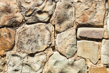 outdoor wall from natural boulders