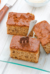 Aerial view of walnut sponge cake with fork