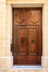 Brown door in Malta