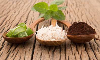 Homemade skin care and body scrub with natural coffee, aloe vera