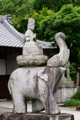 Stone Buddha of lotus seat on an elephant, Kyoto Japan.