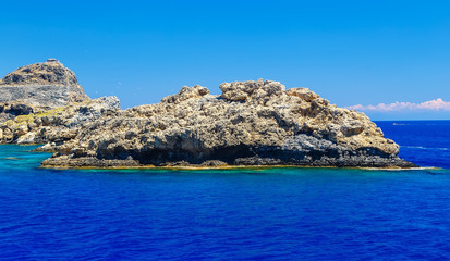 Fototapeta na wymiar Rocks in the sea of the island of Rhodes Greece