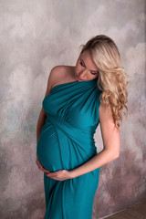 Pregnant woman in blue dress