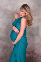 Fototapeta premium Pregnant woman in blue dress