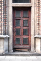 Old vintage brown wooden door. Home.