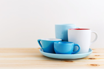 Cup and mug on table with space