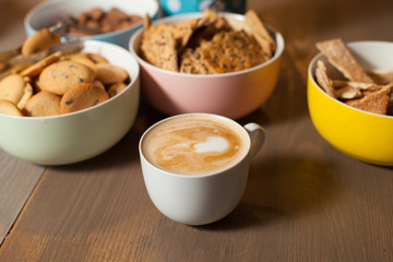 Different cookies with cup