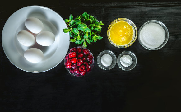 ingredients for cooking pancakes, mint and cherry dessert