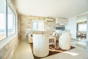 Interior of a guest house room with kitchen