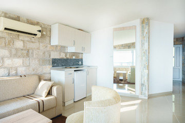 Interior of a guest house room with kitchen