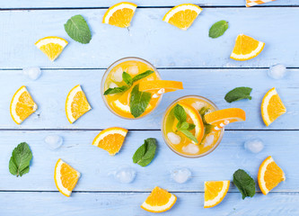 Drink orange with ice in glasses,