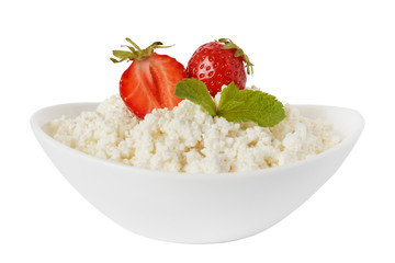 cottage cheese in a bowl with strawberries isolated on a white background - with clipping path - 115299745