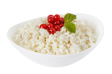 cottage cheese in a bowl with currant  isolated on a white background - with clipping path - 115299755