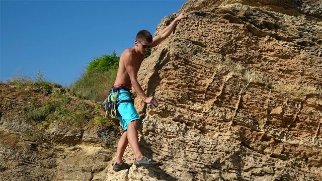 Extreme Climbver Climbing On A Rock, Close Up