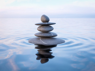 Obraz na płótnie Canvas Balanced Zen stones in water 