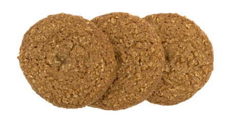 Row of oatmeal sugar free cookies on a white background in a row top view.