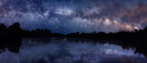Wall murals Lake / Pond Milky Way over the lake