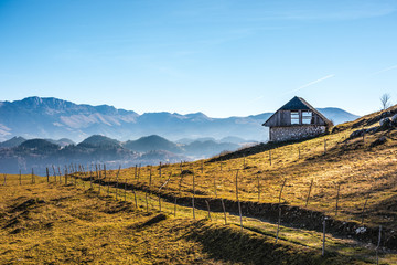 Old traditional wooden house on the hills