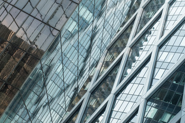 Skyscrapers with glass facade. Modern buildings in Paris business district. Concepts of economics, financial, future.  Copy space for text. Dynamic composition.