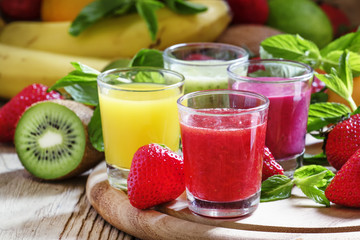 Fruit and berry freshly squeezed smoothies, selective focus