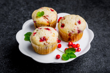 Homemade strawberry muffins in paper cupcake holder