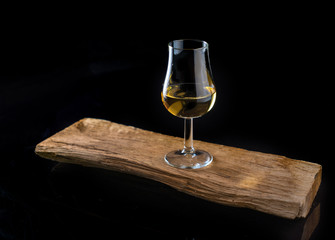 Special glass for distillates - whiskey, brandy, calvados - obrazy, fototapety, plakaty