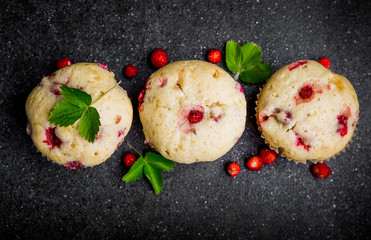 Homemade strawberry muffins in paper cupcake holder