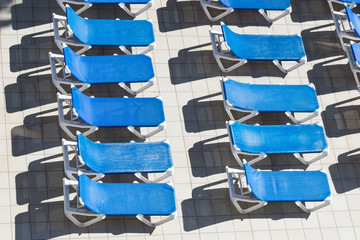 beach chairs by the pool