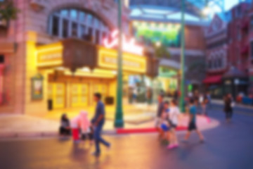 Blurred abstract background of People walk in the amusement park