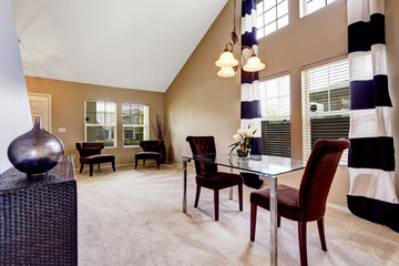 Open floor plan dining room with carpet floor