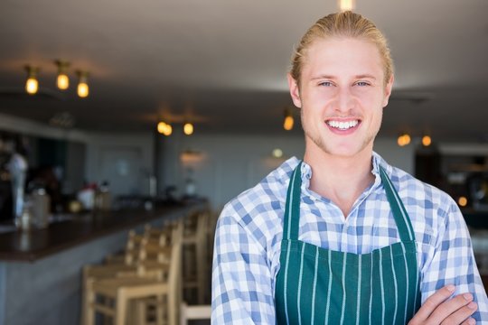 Portrait of waiter smiling