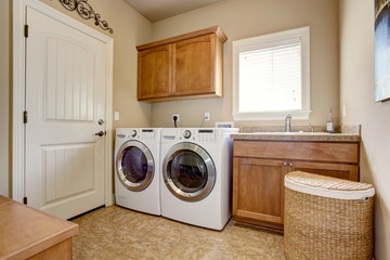 Laundry room with washer and dryer. - obrazy, fototapety, plakaty