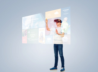 Fototapeta premium happy man in virtual reality headset or 3d glasses