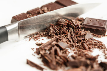 Knife Cutting Dark Chocolate Bar
