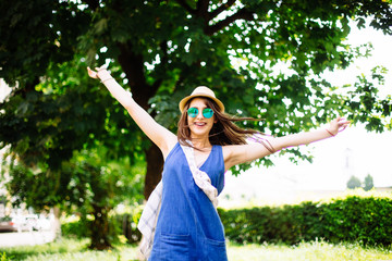 Happy  glory sunny girl in park