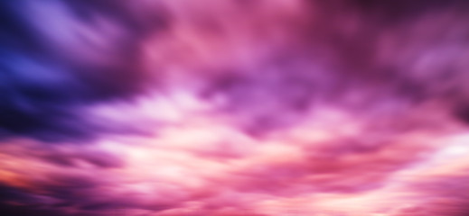 Horizontal vivid vibrant smooth pink clouds cloudscape backgroun
