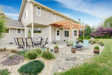 Cozy backyard patio area with table set