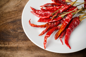 Dried chili on white plate