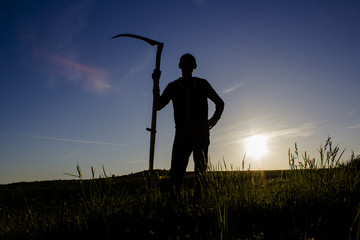 man with a scythe