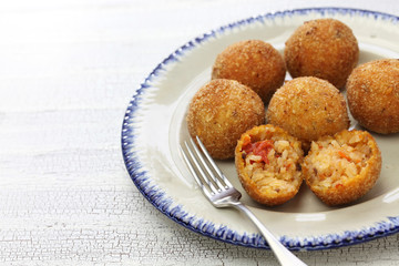 arancini di riso, fried risotto rice balls, italian sicilian food