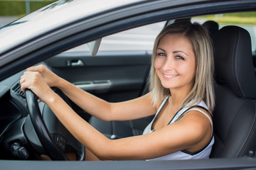 Plakat woman driving a car
