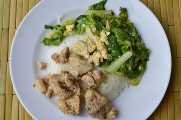 stir fried Chinese cabbage with egg and salty chicken on rice