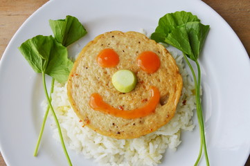 deep fried Vietnamese pork sausage dressing chili sauce on rice