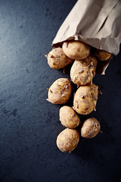 New potatoes in a paper bag
