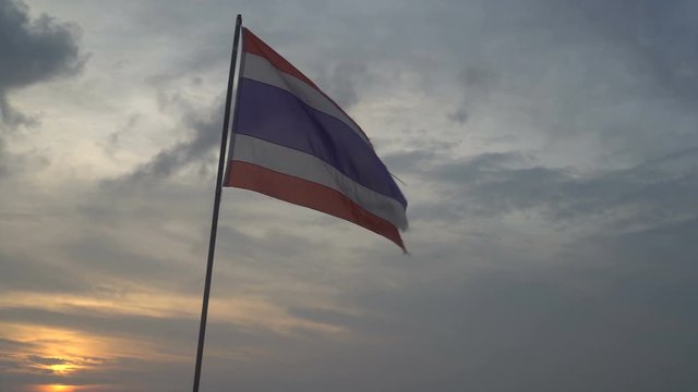 Thai flag blowing in the wind on sky